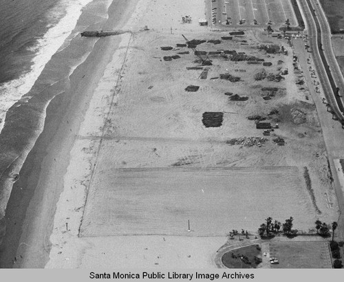 Looking north from the remains of the Pacific Ocean Park Pier to beach parking lots, July 10, 1975, 2:30 PM