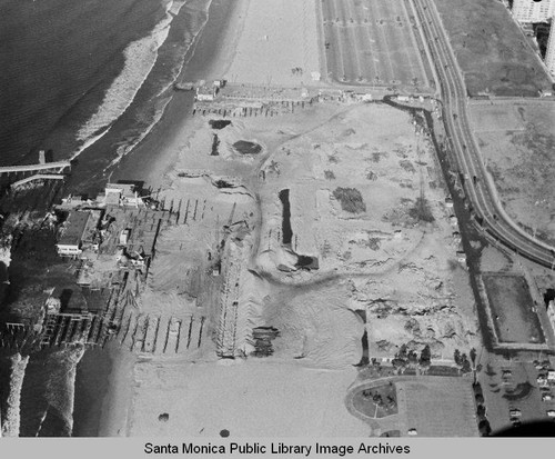 Aerial view of the remains of the Pacific Ocean Park Pier, Santa Monica looking north, December 23, 1974