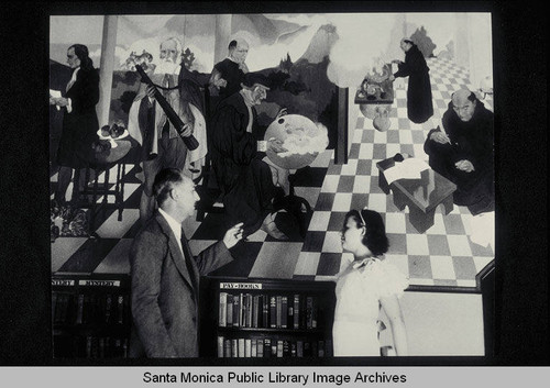 Stanton Macdonald-Wright and Barbara Douglas, daughter of Donald Douglas, at the installation and unveiling of his murals painted for the Santa Monica Public Library (503 Santa Monica Blvd.), August 25, 1935