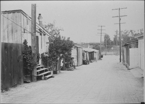 Alley looking south to Colorado Avenue and the arroyo, Santa Monica, Calif