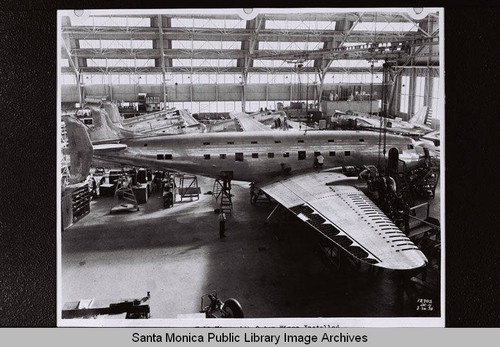 Douglas DC-4 in hangar with wings installed, March 26, 1938, Santa Monica, Calif