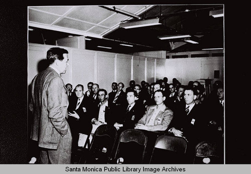 Donald Douglas addresses a group at the Douglas Aircraft Company Santa Monica plant