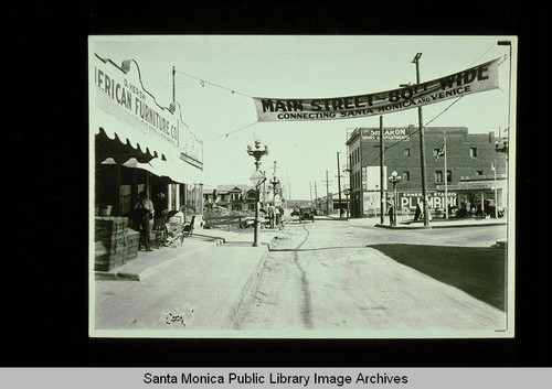 D. Hersh American Furniture on Main Street at Pier Avenue, Ocean Park, Calif. with Shearon Rooms and Apartments across the street next to the Standard Oil Company service station, September 8, 1926