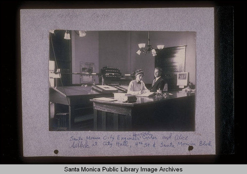 Santa Monica City Engineer Howard Carter and Alice Selleck in City Hall, Santa Monica Blvd