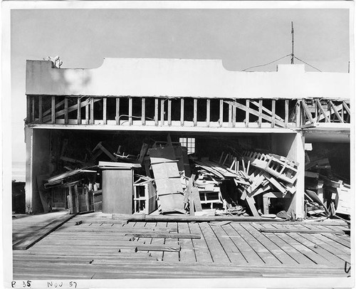 Discarded pilings and other material at the construction site of Pacific Ocean Park, November, 1957, Santa Monica, Calif