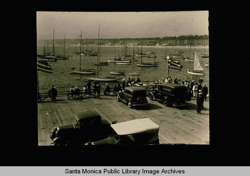 Santa Monica Yacht Harbor from the Pier with a Pioneer Public Market truck in the foreground