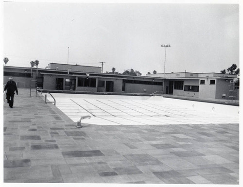 Construction of the Santa Monica Municipal Swimming Pool showing Ashlar pattern on pool deck after staining, May 18, 1951