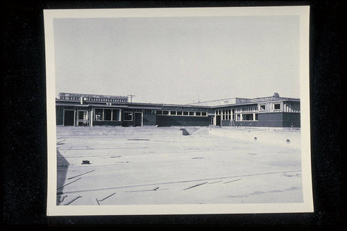 Construction of the Santa Monica Municipal Pool showing the pool and bathhouse prepared for stucco, December 22, 1950