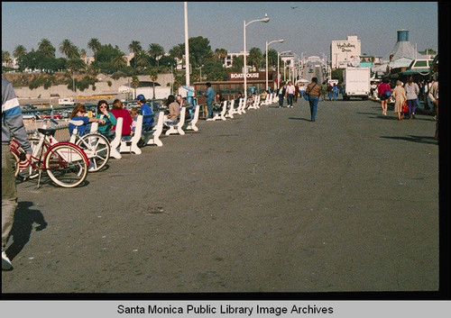 Looking up the ramp of the Santa Monica Pier to the Holiday Inn