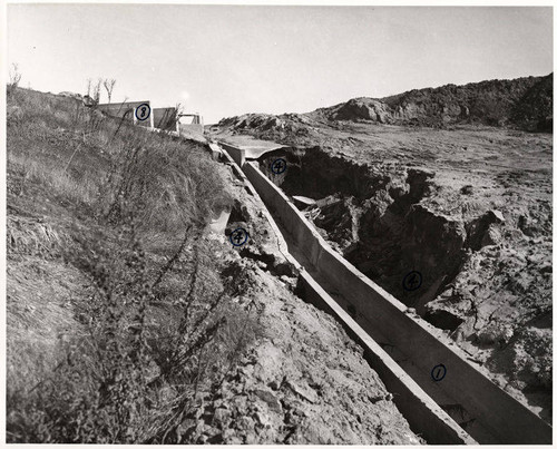 Damage to the storm drain canal on the southwest slope of the Santa Monica Municipal Airport, November 22, 1952