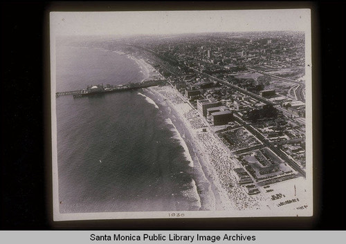 Aerial of the Santa Monica Pier looking northwest along the coast, July 13, 1930