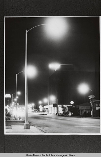 New street lights at night on Wilshire Blvd. looking toward the Union Bank, Santa Monica, Calif