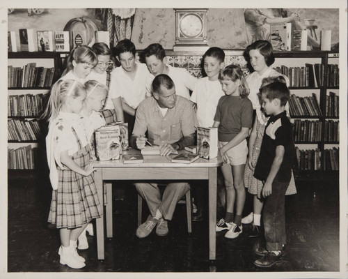 Author Robb White meeting with young patrons in the Boys and Girls Room during 'Book Week