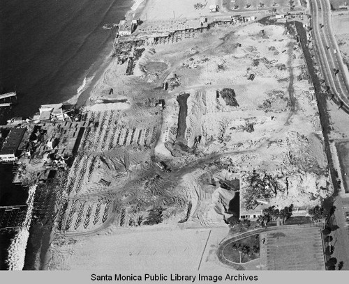 Aerial view of the remains of the Pacific Ocean Park Pier, Santa Monica looking south, December 16, 1974, 10:30AM