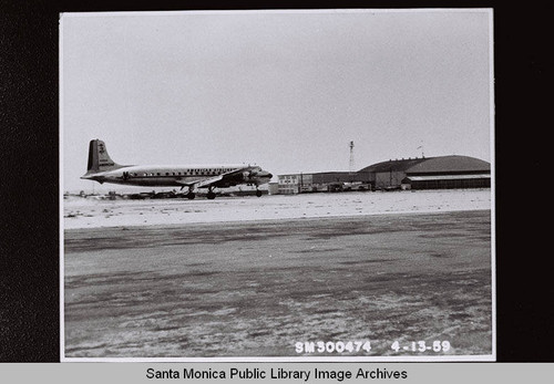 American Airlines Douglas Aircraft Company DC-7 airplane after landing at Santa Monica Municipal Airport on April 13, 1959