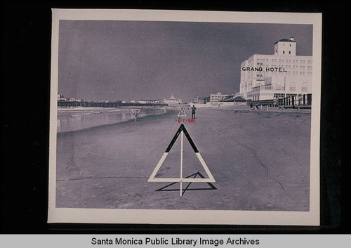 Tide studies (target in foreground represents the mean high tide line in 1921) looking north to the Grand Hotel and Santa Monica Pier with tide at 1.9 feet on November 17, 1938 at 9:59 AM