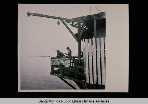 Fishing from a platform on the Santa Monica Pier