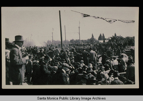 Crowd of spectators at the Santa Monica automobile road race on Ocean Avenue
