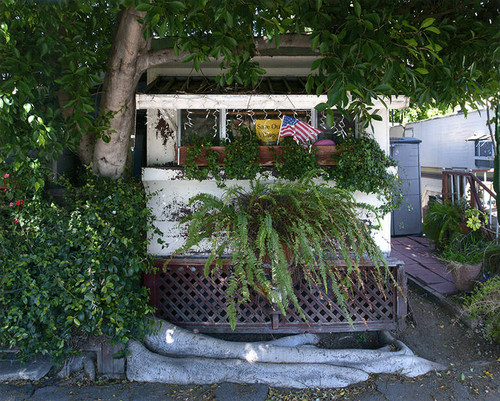 Unit C-10 in Village Trailer Park at 2930 Colorado Ave. in Santa Monica, with a ''Save Our Village!'' sign in the window