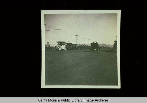 Automobiles with a view north to the Santa Monica Mountains