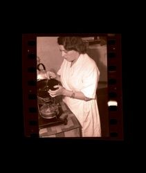 Woman cooking on a portable stove, Shanghai, China