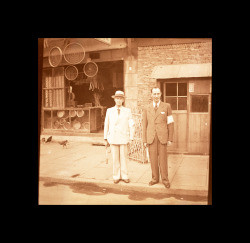 Men wearing armbands in front of stores, Shanghai, China