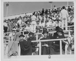 Hugh Duce, S.J., and Louis Rudolph, S.J., at football game