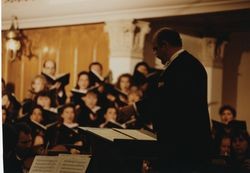 Paul Salamunovich conducting choir in concert