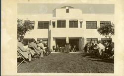 James N. Loughran, S.J. giving speech in front of Doolan Hall