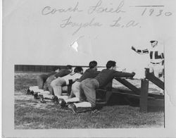 Tom Lieb coaching Loyola football players