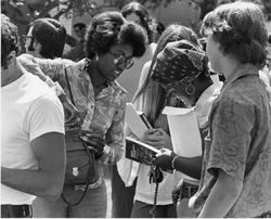 Students browsing LMU course catalogs