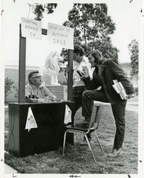 Thomas Higgins, S.J., at Spiritual Advice Booth