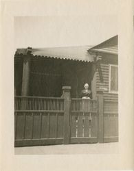 Photograph of Mrs. Beauchamp standing at Brownson House