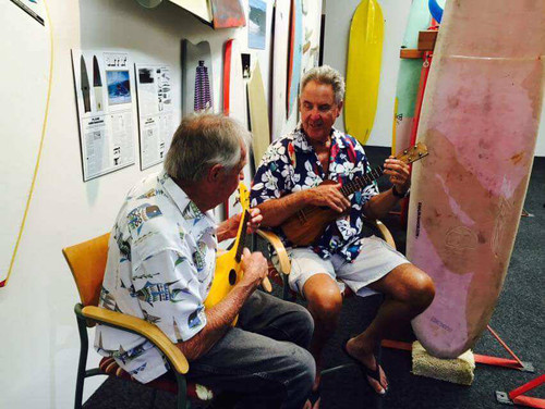 Tom Morey and Chuck Herpick playing ukuleles