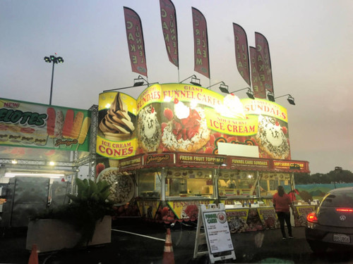 Funnel cake vendor at OC Fair's "Fair Food Drive Thru"