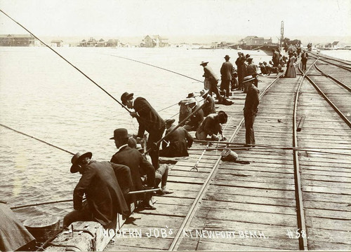 Men fishing at the Newport Beach Pier