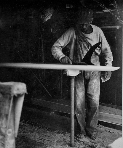 Ted Sizemore shaping a surfboard