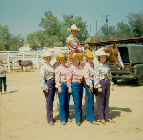 Rodeo performer Montie Montana with the Chandler sisters