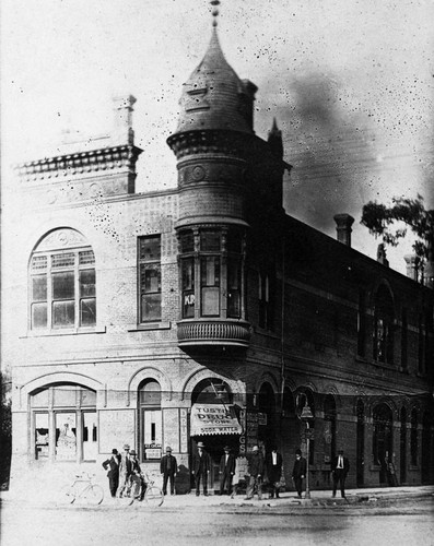 Tustin First National Bank with its Romanesque architecture, and the Tustin Drug Store in the bank building