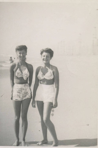 Madeline Jurkovich and Annabelle Hennig McNeil posing at Huntington Beach, 1945