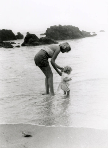 Athalie Richardson Irvine Clarke with daughter Joan as a toddler at Irvine Cove, ca. 1935