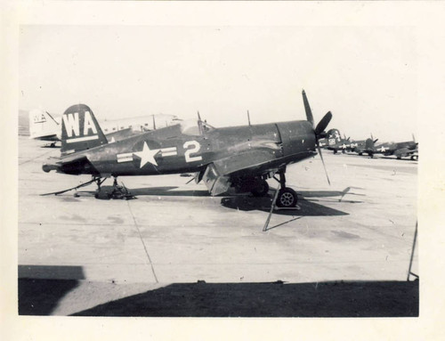 F4U-4 Corsair Marine fighter jet tied down with chains, MCAS El Toro 1947