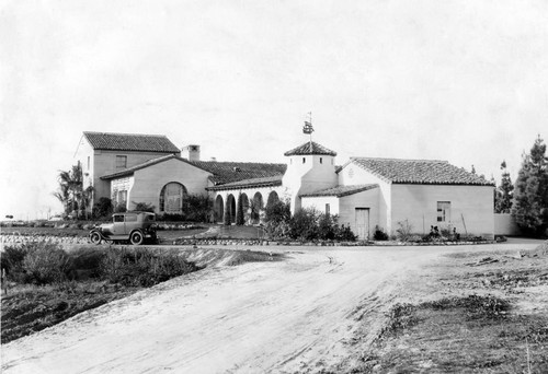 Charles E. Utt's Lemon Heights home and new Ford Sedan