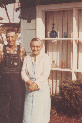 Sam and Christina Hennig in front of their home in Huntington Beach, 1962