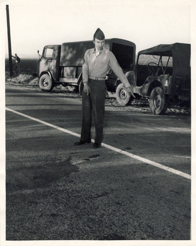 Provost Sergeant Jordan Spahn with military vehicles, 1965