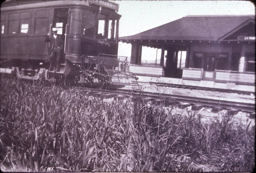 Pacific Electric Depot with railroad car, La Habra