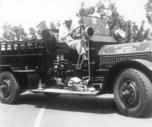 Myford Irvine driving Santa Ana Fire Engine #2