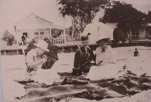 Ladies of the Irvine family at Main Beach, Laguna