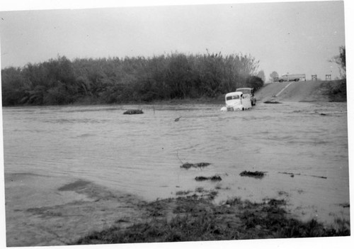 Flood at Edinger Avenue at Santa Ana River, Fountain Valley, 1958