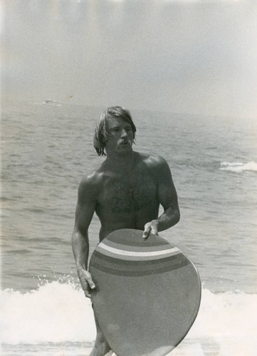 Charles "Tex" Haines with his Skimboard